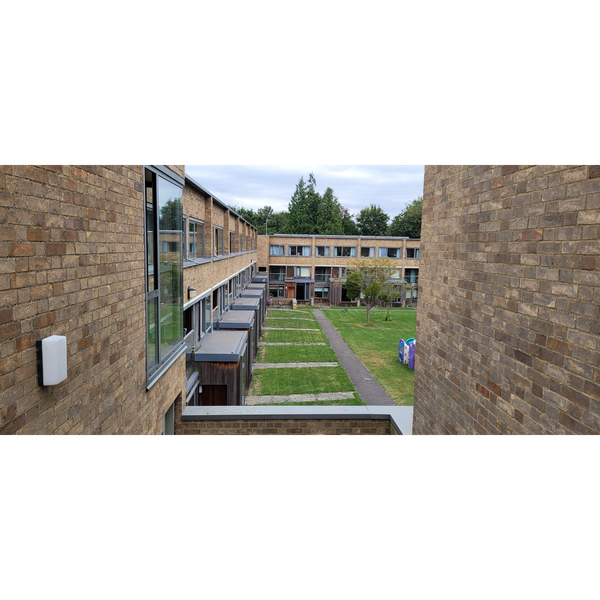 A photograph of the retrofitted Wolfson Flats, Churchill College