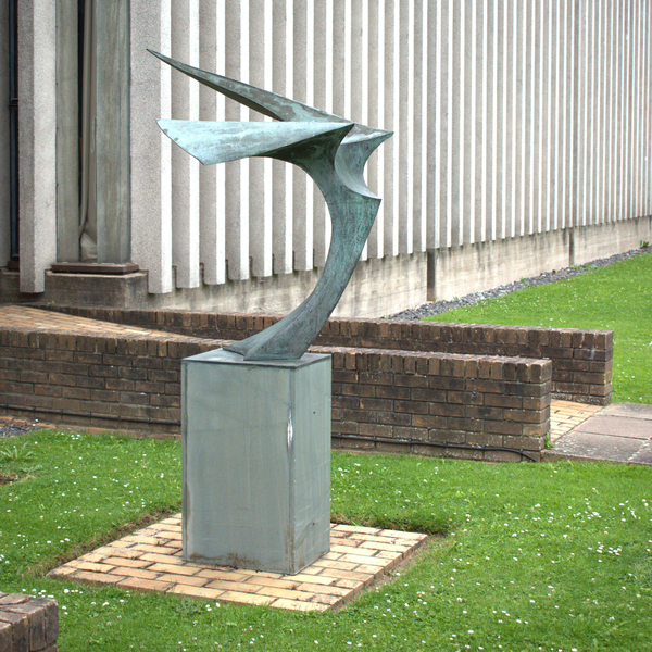 A photograph of Peter Lyon's sculpture, 'Flight' outside the Churchill Archives Centre