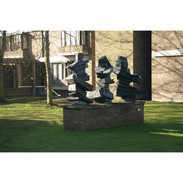 A photograph of Crampton's sculpture 'Three Judges' on the Jock Colville Lawn, Churchill College