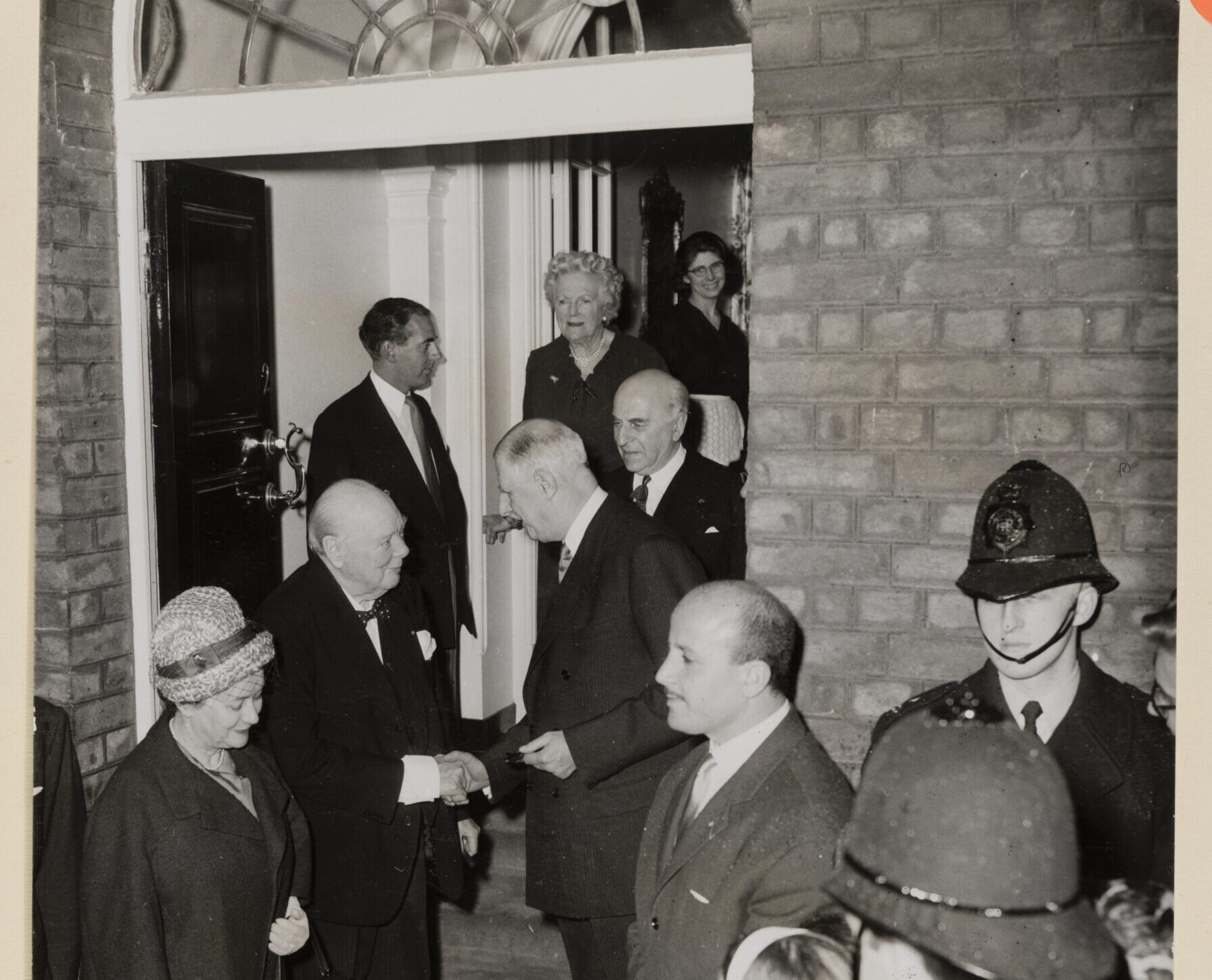CSCT 5 8 158 Black and white photo of Churchill shaking hands with Charles de Gaulle outside 10 Downing Street, 1960