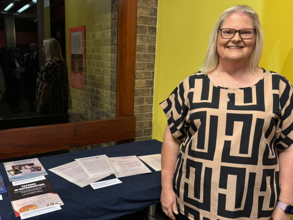 Louise Brown (the first IVF baby) with the display in the Wolfson Foyer