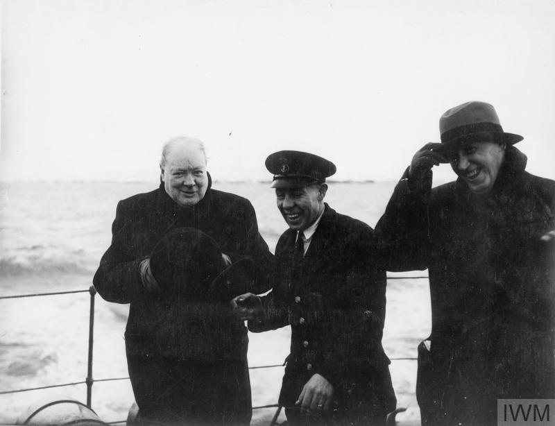 LORD HALIFAX LEAVES FOR USA IN HMS KING GEORGE V TO TAKE UP HIS POST AS AMBASSADOR. JANUARY 1941, THE PRIME MINISTER AND OTHERS WERE AT A NORTHERN BASE TO SEE LORD HALIFAX OFF. (A 2707) Prime Minister with Mr Hopkins and a Petty Officer. Copyright: © IWM. Original Source: http://www.iwm.org.uk/collections/item/object/205137064