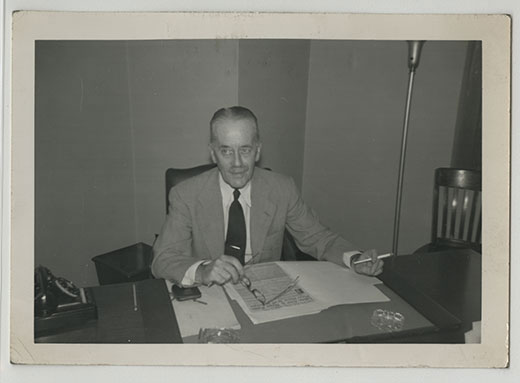 Photograph of Sir Alexander Cadogan at his desk